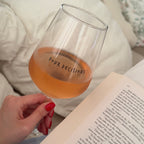 Wine glass with fun printed text.